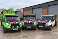 A Star vans lined up at a business park ready for a commercial collection