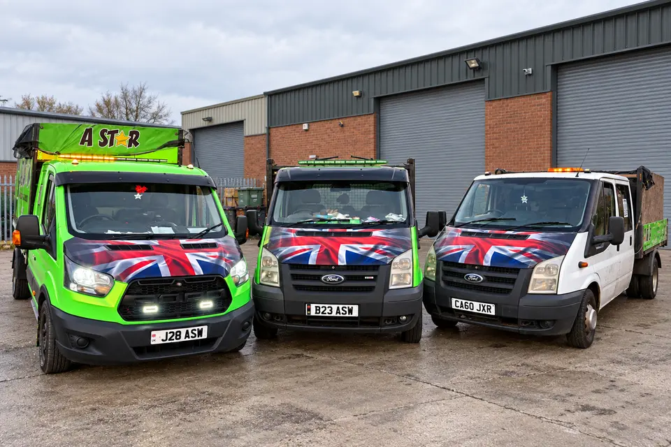 A Star vans lined up at a business park ready for a commercial collection