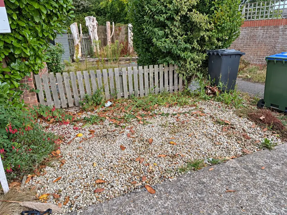 After: the gravel area empty and tidy