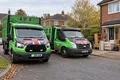 Two A Star vans outside a detached house during a full property clearance