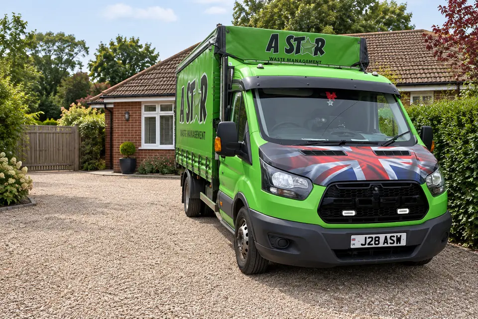 A Star Waste Management van with its Union Jack bonnet outside a Sussex bungalow